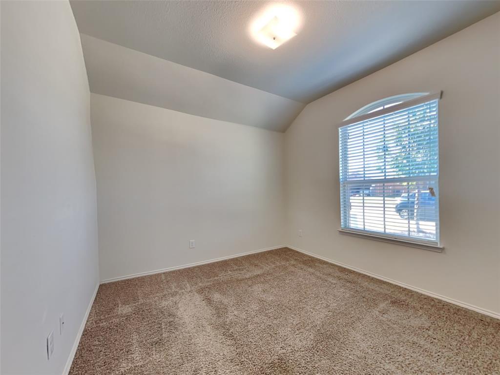 253 Pitt Circle Fate, TX 75189 - Photo 14 of 22 an empty room with a window