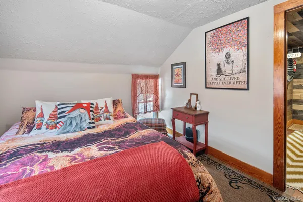 a room with a bed and a window