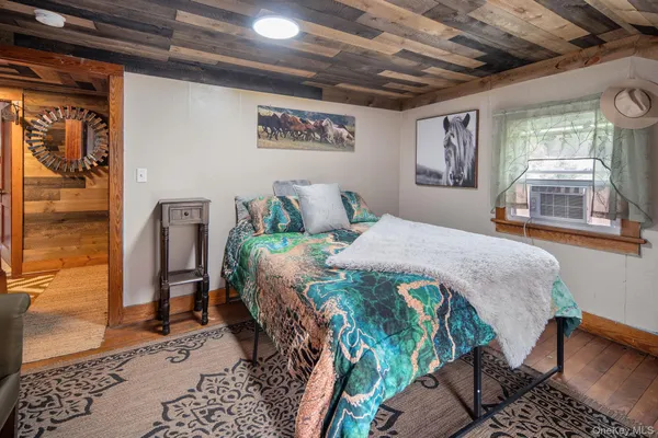 a view of a backyard with sitting area