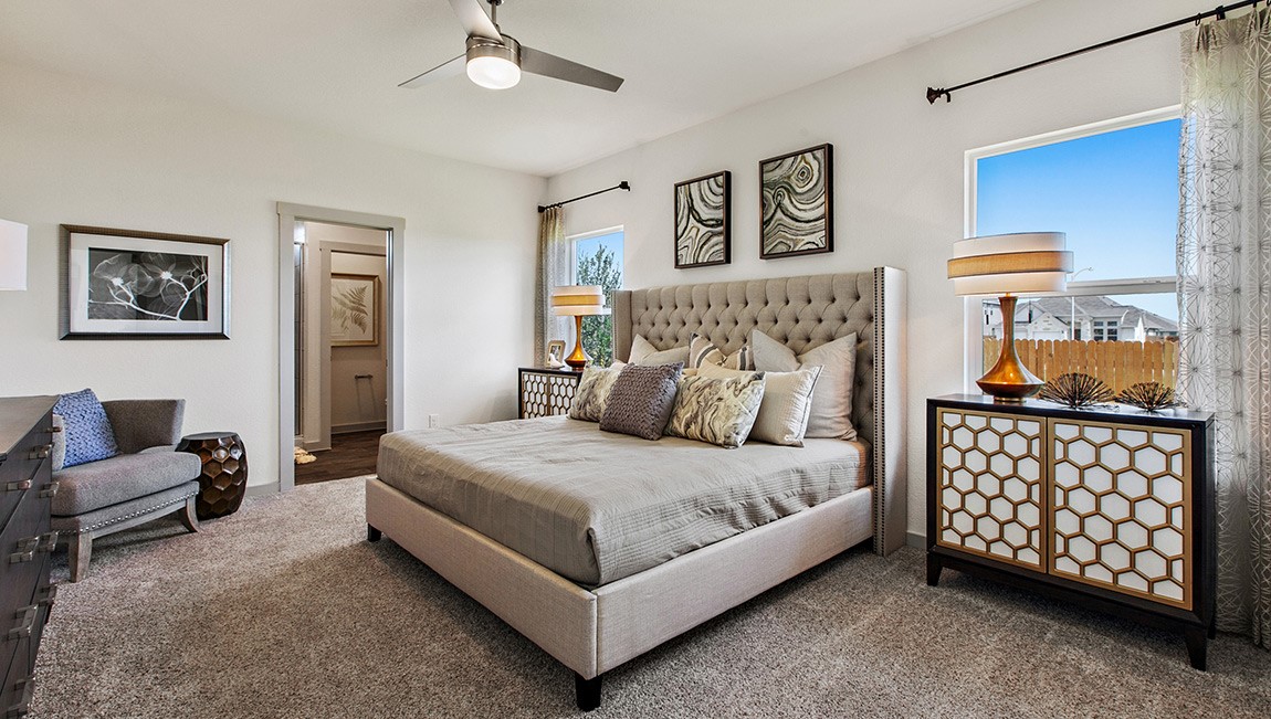 4712 Oxgang Drive Pflugerville, TX 78660 - Photo 18 of 33 a bedroom with a bed and window