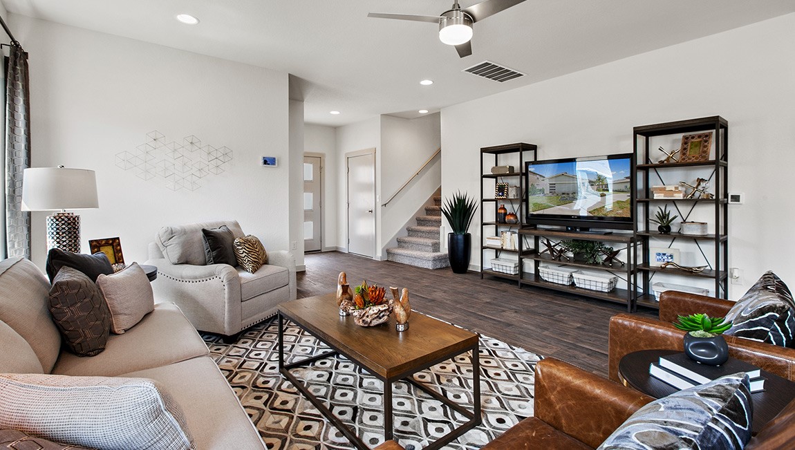 4712 Oxgang Drive Pflugerville, TX 78660 - Photo 7 of 33 a living room with furniture and wooden floor