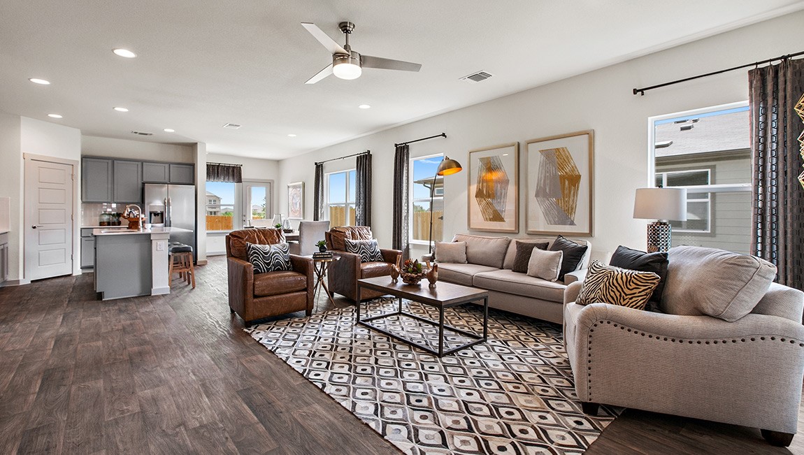 4712 Oxgang Drive Pflugerville, TX 78660 - Photo 10 of 33 a living room with furniture kitchen view and a window