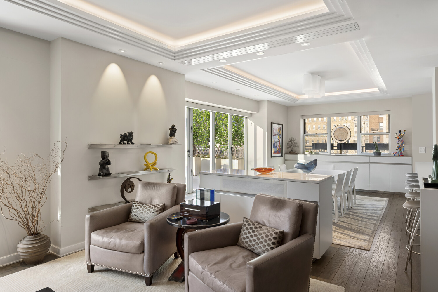 2 5th Avenue, Unit 14R Manhattan, NY 10011 - Photo 14 of 21 a living room with furniture and a large window