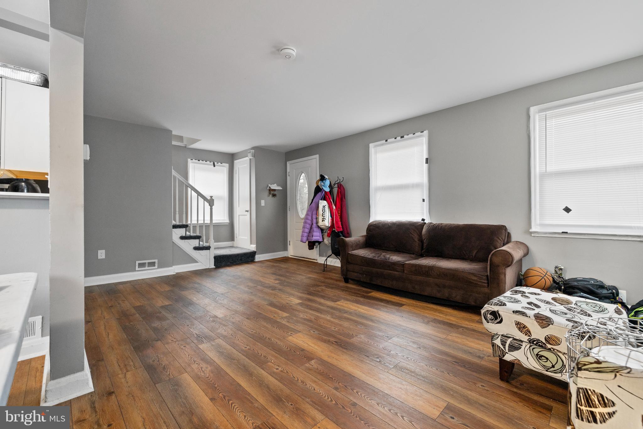 2717 Talbot Road Baltimore, MD 21216 - Photo 3 of 12 a living room with furniture and a window