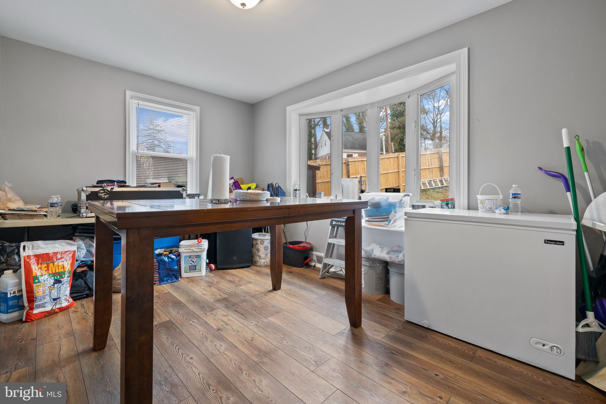 2717 Talbot Road Baltimore, MD 21216 - Photo 5 of 12 a view of a workspace with furniture and window