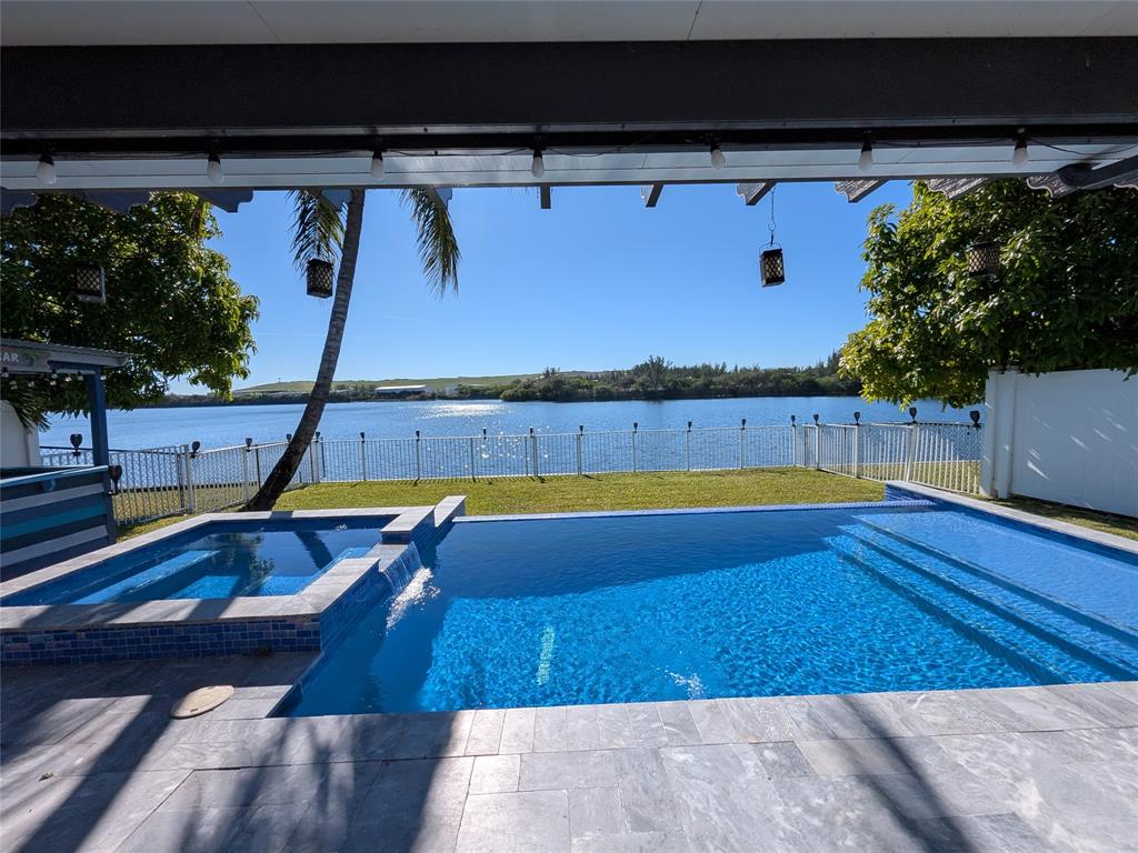 4572 Southwest 14th Street Deerfield Beach, FL 33442 - Photo 42 of 58 Heated pool