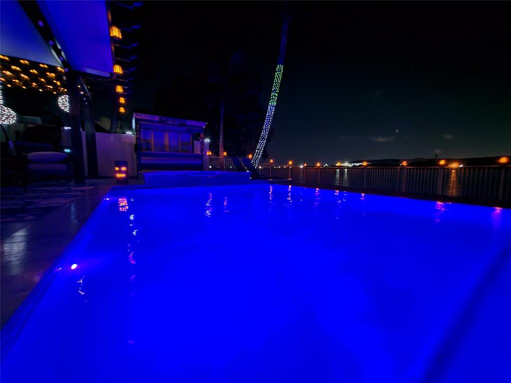 4572 Southwest 14th Street Deerfield Beach, FL 33442 - Photo 50 of 58 a view of swimming pool with outdoor seating