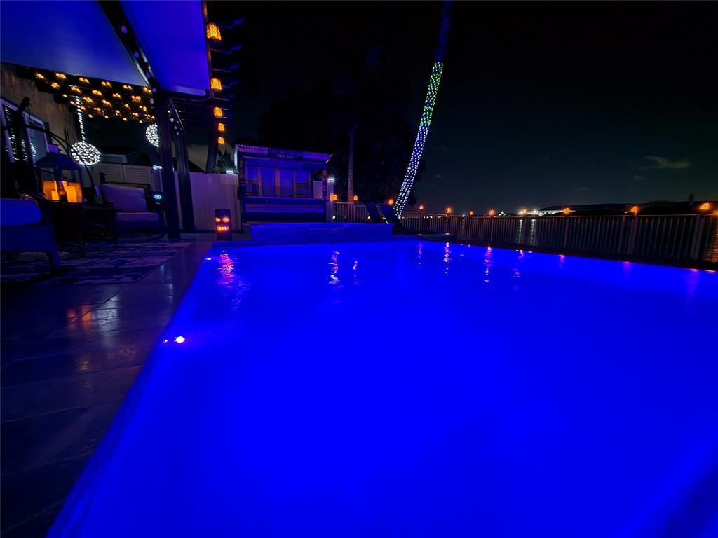 4572 Southwest 14th Street Deerfield Beach, FL 33442 - Photo 52 of 58 a view of swimming pool with sitting area