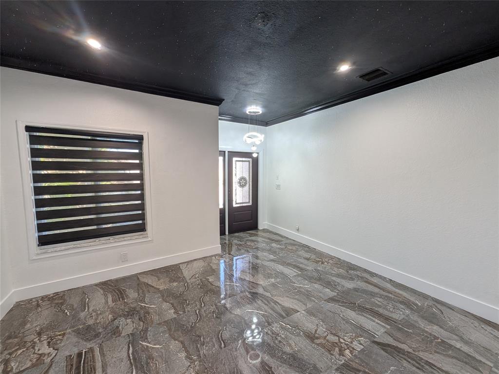 4572 Southwest 14th Street Deerfield Beach, FL 33442 - Photo 6 of 58 a view of an empty room and a window