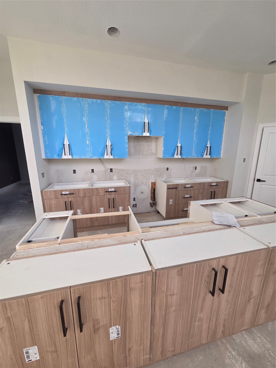 1207 Collier Street Houston, TX 77023 - Photo 12 of 12 a kitchen with a sink and cabinets