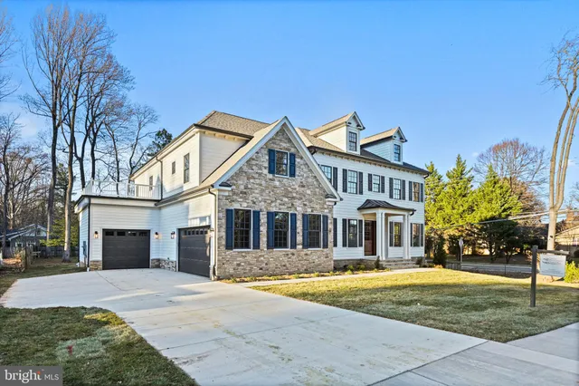 a front view of a house with a large windows