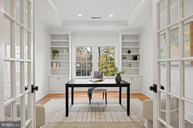 a white tub sitting in a bathroom