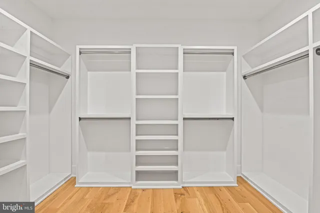 a kitchen with cabinets and stainless steel appliances