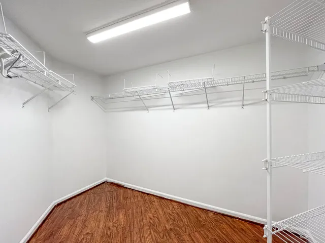 a view of a room with racks on the wall