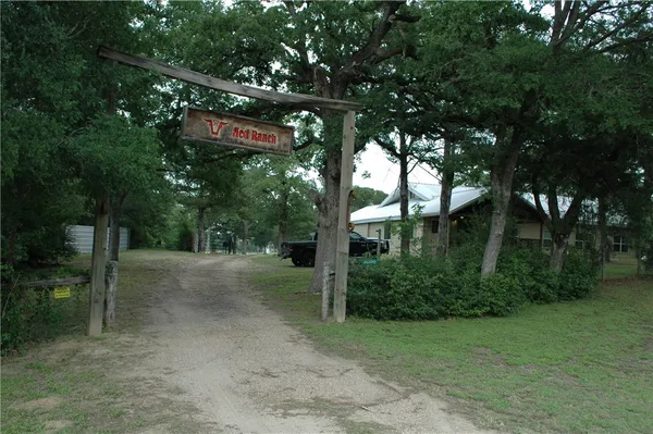 a view of a street with trees