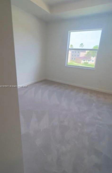 12147 Northwest 23rd Court Miami, FL 33167 - Photo 12 of 19 an empty room with a window