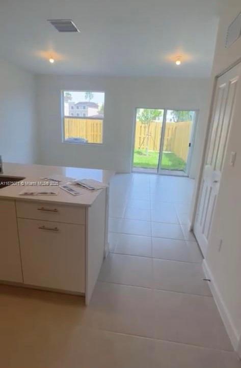 12147 Northwest 23rd Court Miami, FL 33167 - Photo 6 of 19 a utility room with washer and dryer
