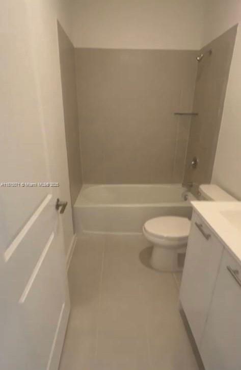 12147 Northwest 23rd Court Miami, FL 33167 - Photo 10 of 19 a bathroom with a toilet and a bath tub