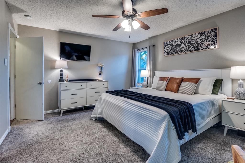 656 Condor Trail Saginaw, TX 76131 - Photo 14 of 25 a bedroom with bed and window