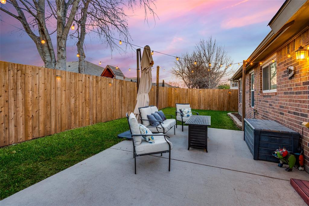 656 Condor Trail Saginaw, TX 76131 - Photo 20 of 25 a white bench sitting in front of a house