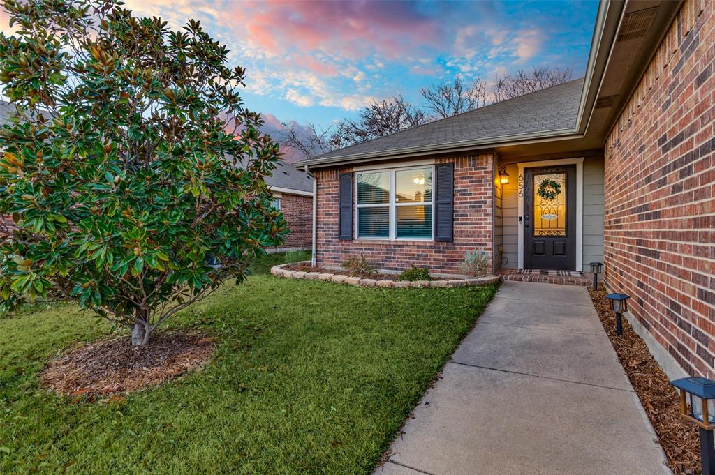 656 Condor Trail Saginaw, TX 76131 - Photo 2 of 25 front view of a house with a yard