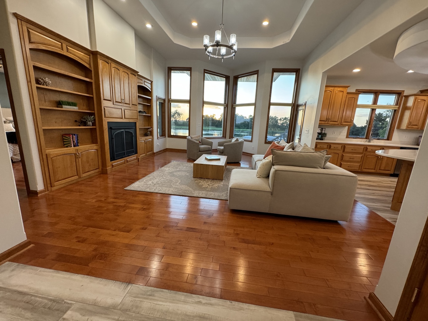 8726 East Goodfarm Road Gardner, IL 60424 - Photo 2 of 12 a living room with fireplace furniture and a flat screen tv