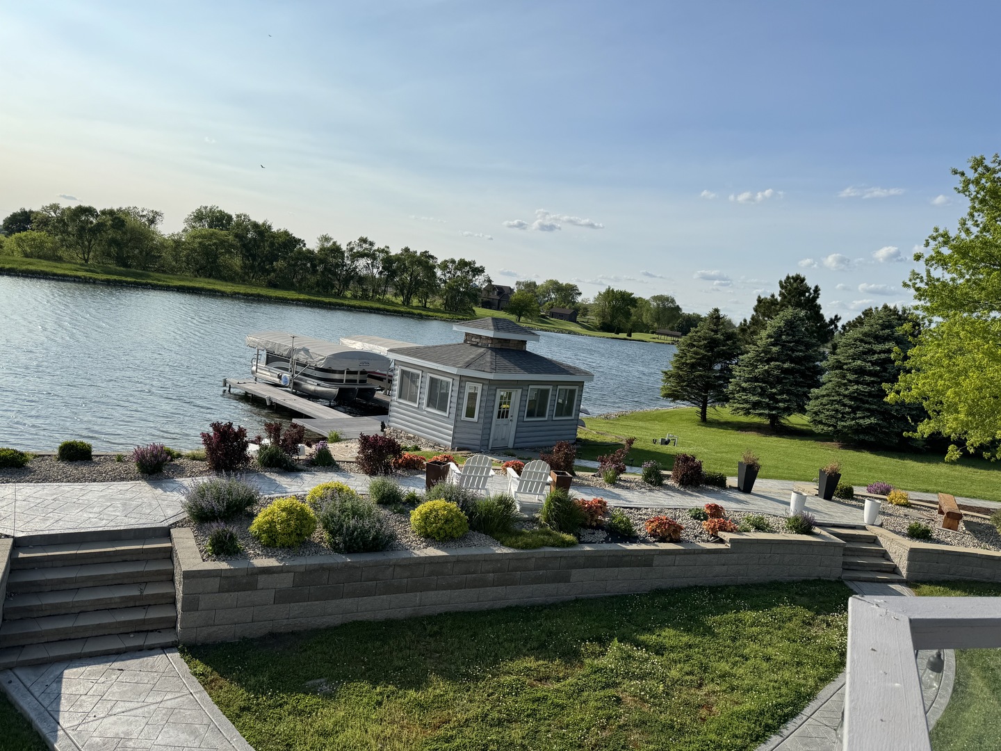8726 East Goodfarm Road Gardner, IL 60424 - Photo 10 of 12 a view of house with swimming pool and outdoor seating