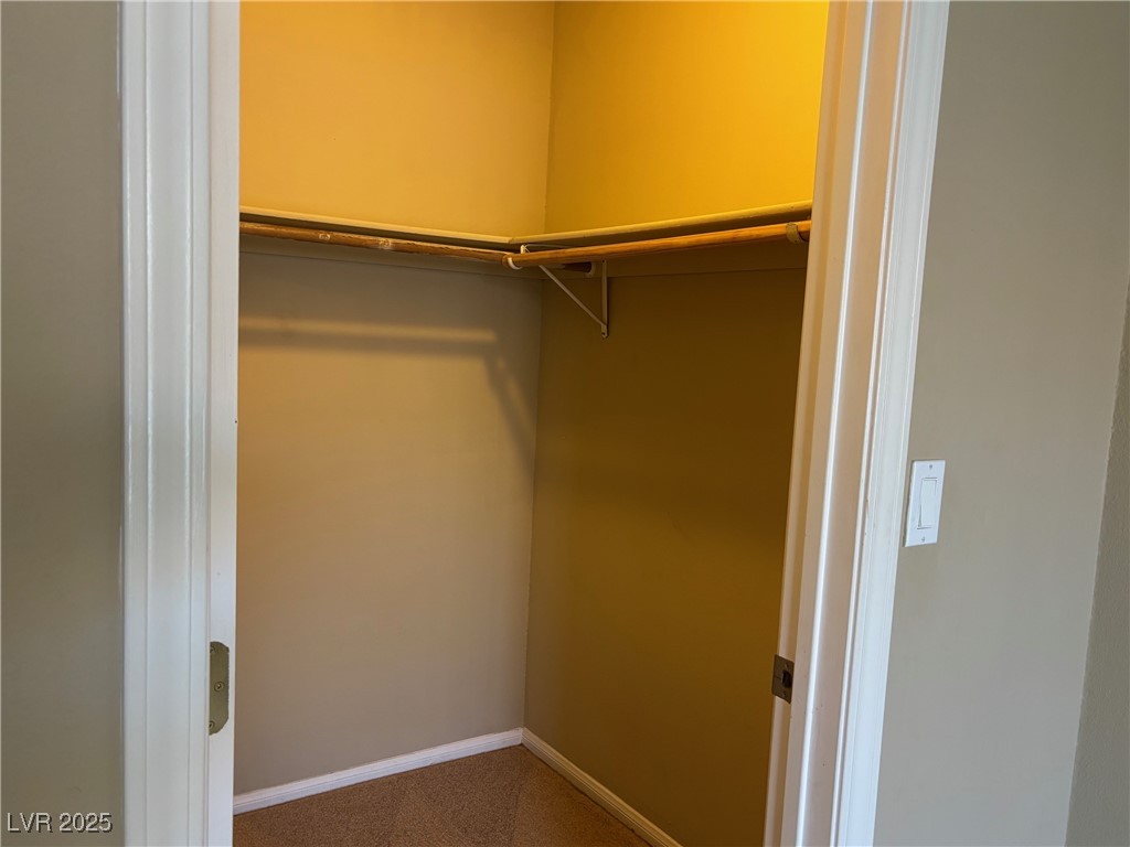 7300 West Pirates Cove Road, Unit 2054 Las Vegas, NV 89145 - Photo 9 of 16 Spacious closet featuring carpet