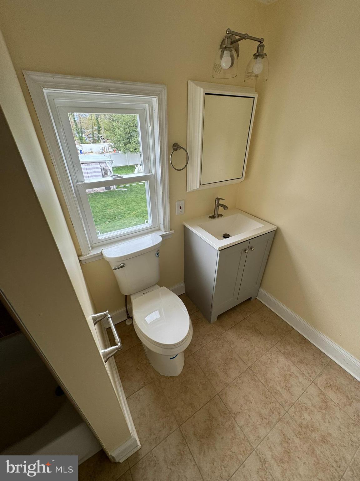 509 Laurel Street Beverly, NJ 08010 - Photo 18 of 47 a bathroom with a sink toilet and shower