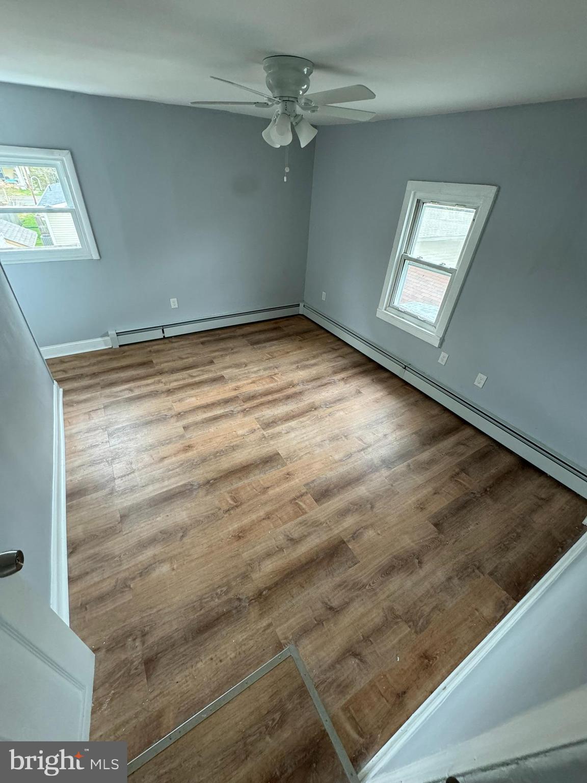 509 Laurel Street Beverly, NJ 08010 - Photo 19 of 47 an empty room with windows