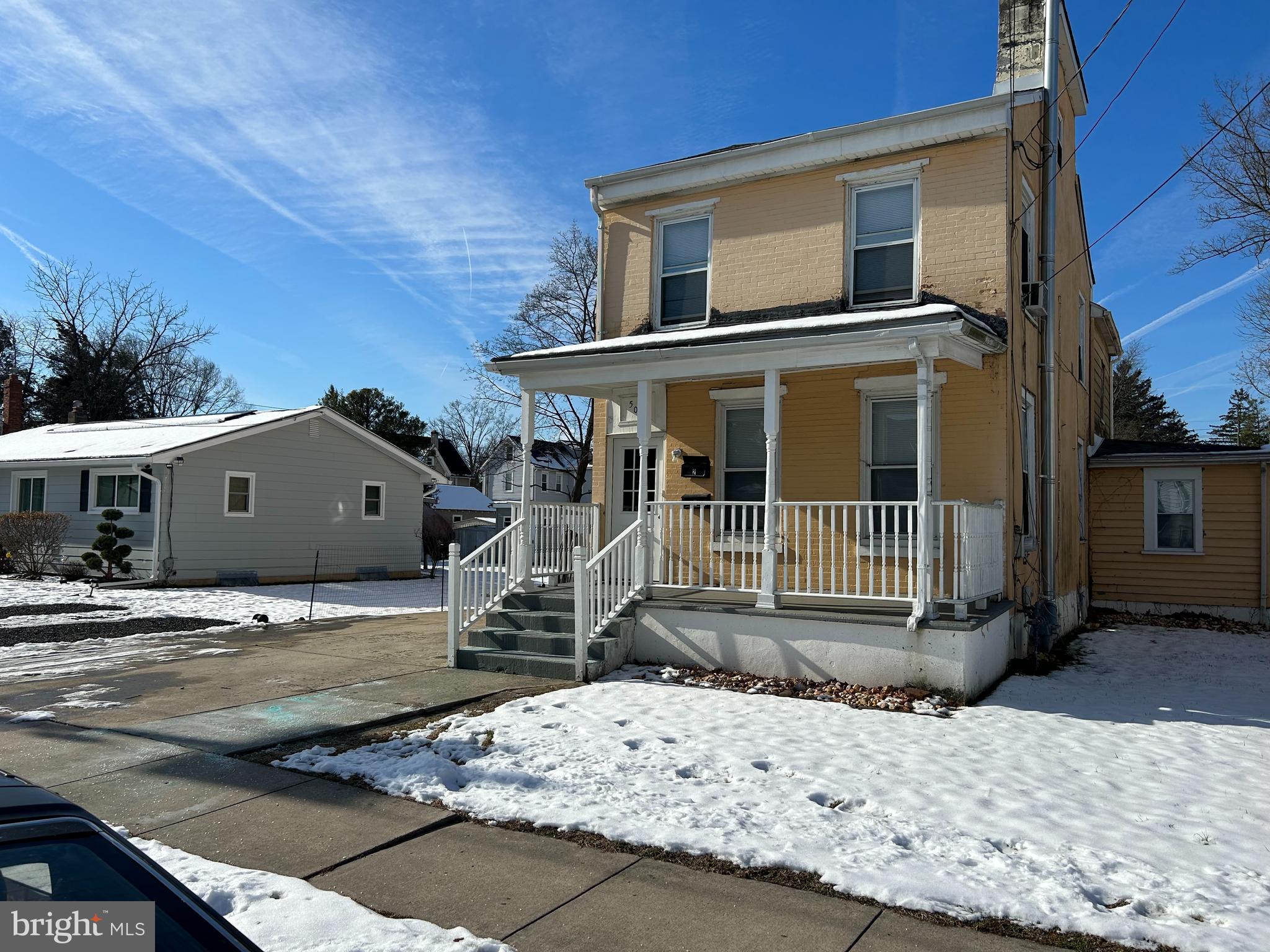 509 Laurel Street Beverly, NJ 08010 - Photo 2 of 47 a front view of a house with a yard