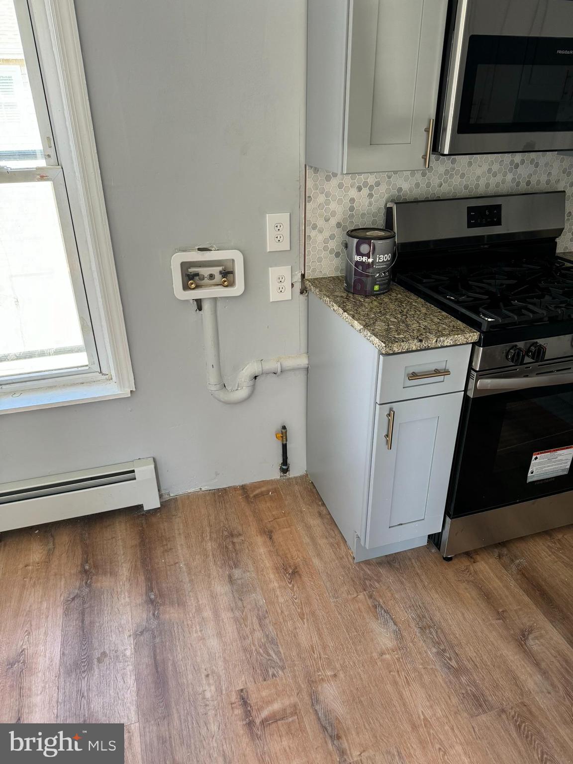 509 Laurel Street Beverly, NJ 08010 - Photo 32 of 47 a kitchen with a stove and a microwave