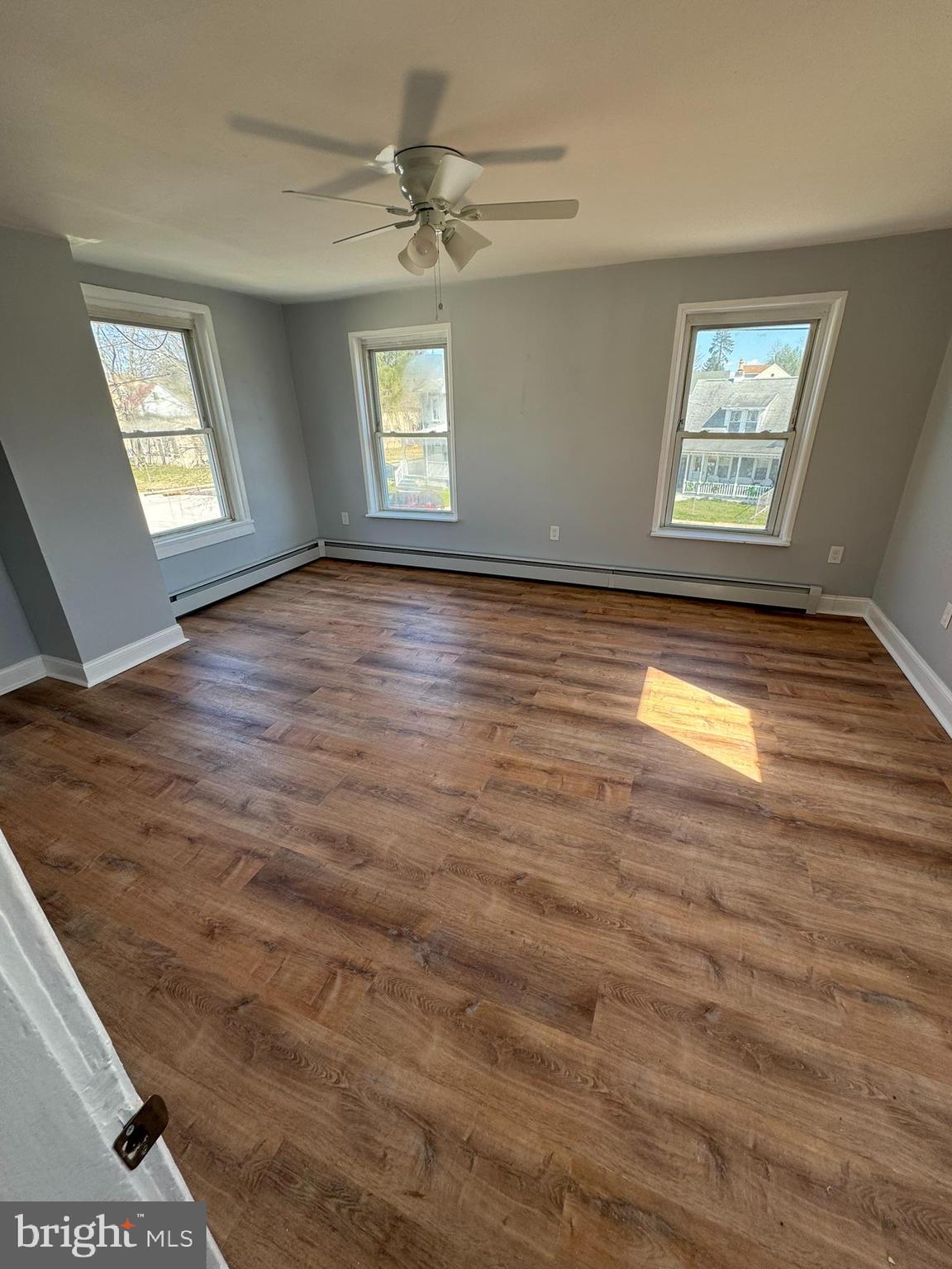 509 Laurel Street Beverly, NJ 08010 - Photo 39 of 47 wooden floor in an empty room with a window