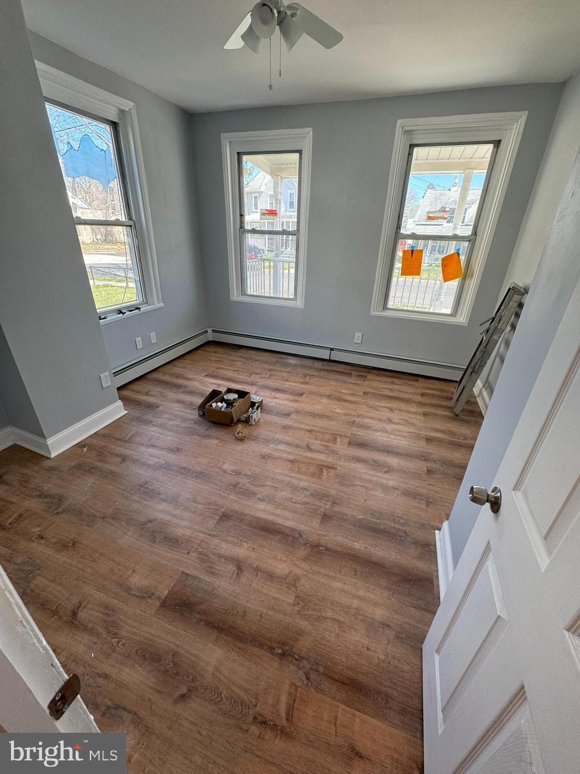 509 Laurel Street Beverly, NJ 08010 - Photo 6 of 47 a backyard of a house with wooden floor and windows