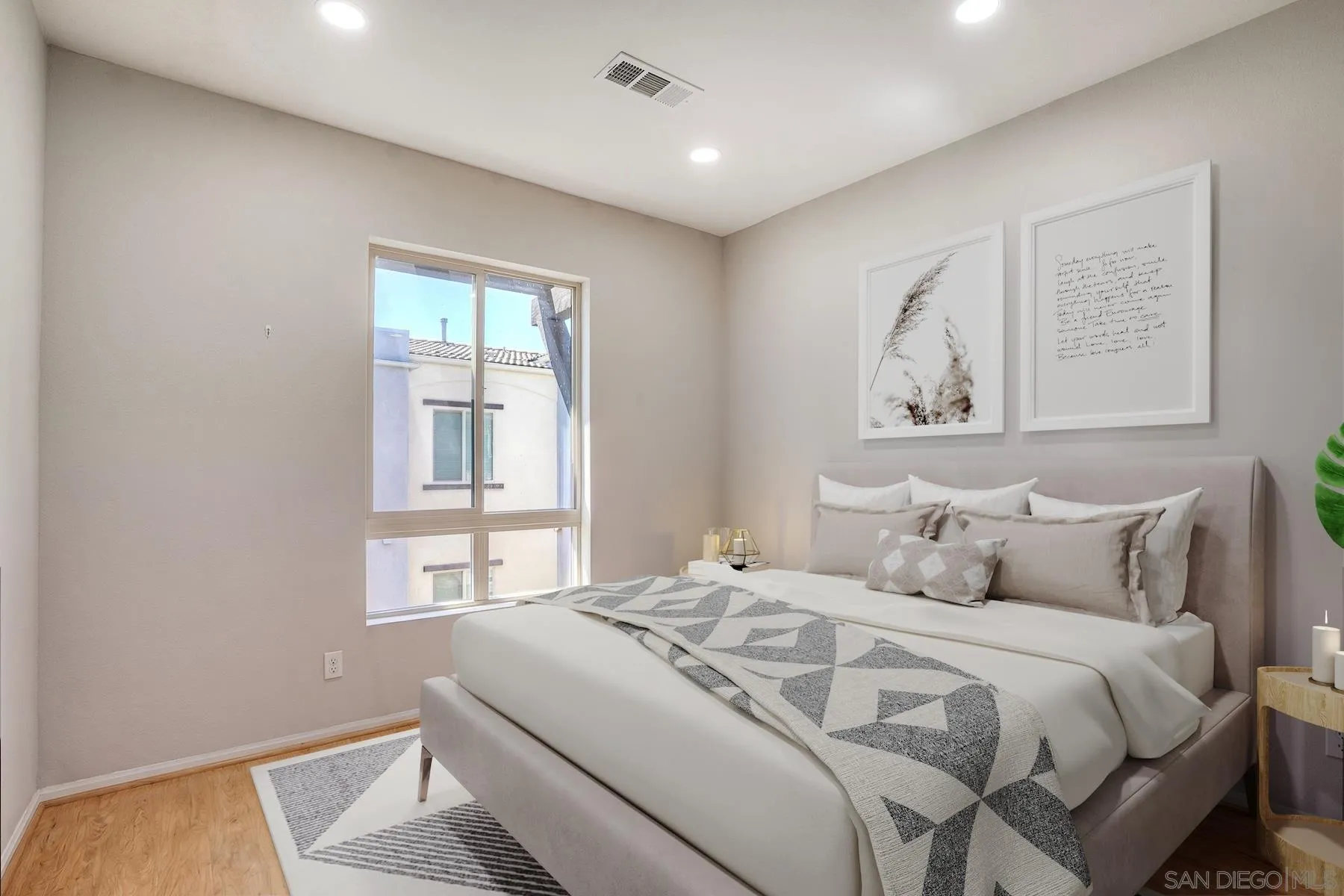 8850 Olive Lane, Unit 7 Santee, CA 92071 - Photo 15 of 27 a bedroom with a bed and a window