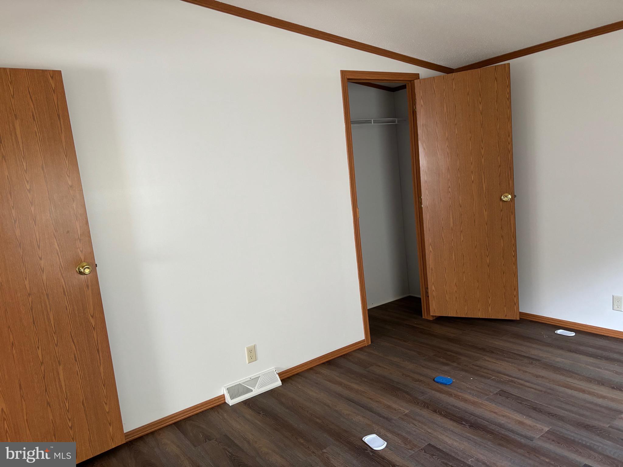 3825 Dickenson Mountain Road Franklin, WV 26807 - Photo 19 of 32 a view of an empty room with wooden floor