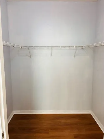 a view of an empty walk in closet