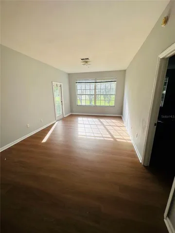 an empty room with windows