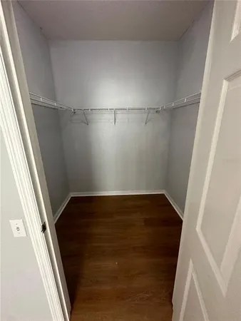a view of an empty walk in closet
