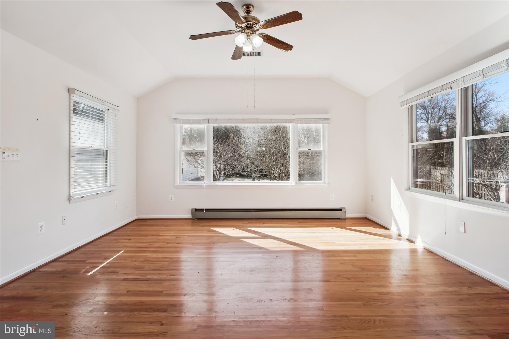 10607 Judicial Drive Fairfax, VA 22030 - Photo 26 of 60 a view of empty room with wooden floor and fan