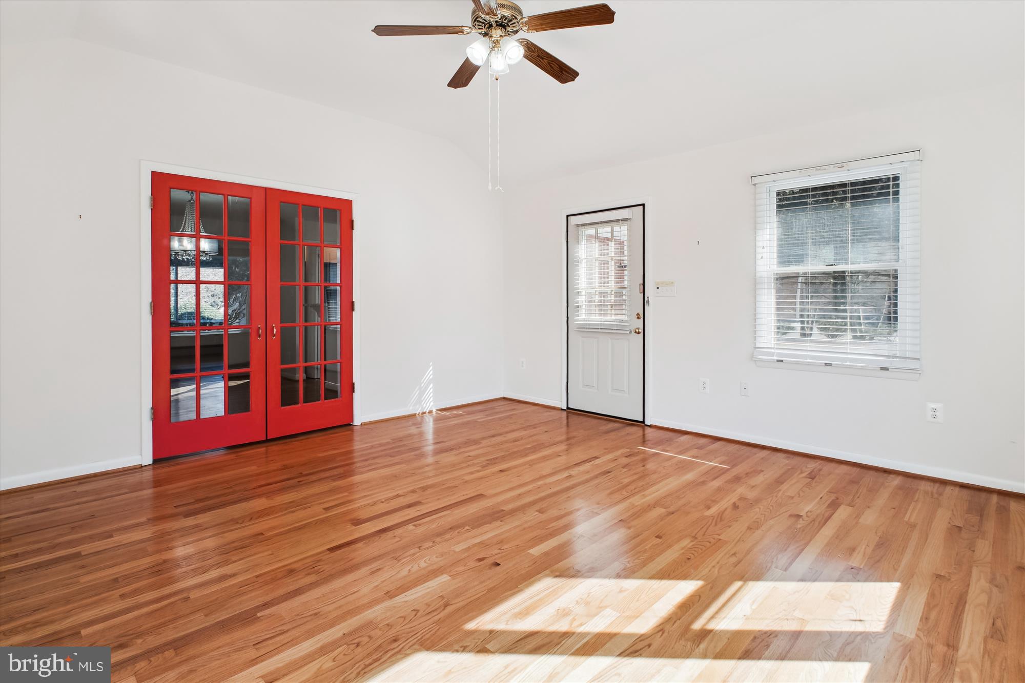 10607 Judicial Drive Fairfax, VA 22030 - Photo 30 of 60 a view of empty room with wooden floor and fan