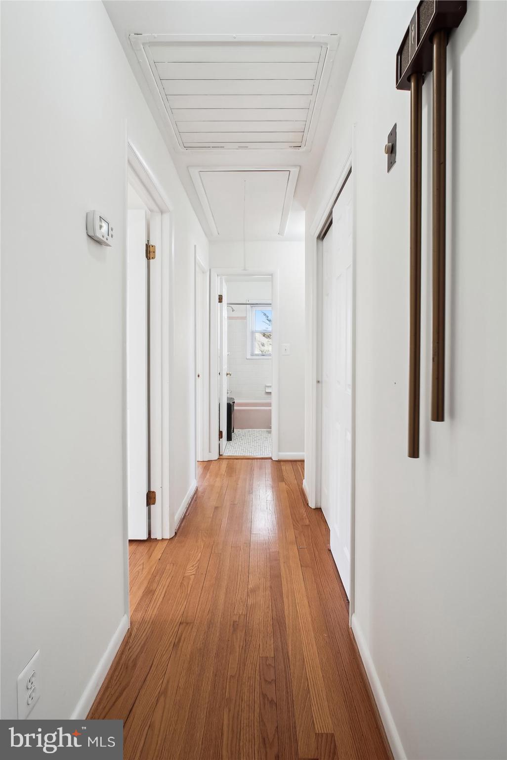 10607 Judicial Drive Fairfax, VA 22030 - Photo 38 of 60 a view of a hallway with wooden floor