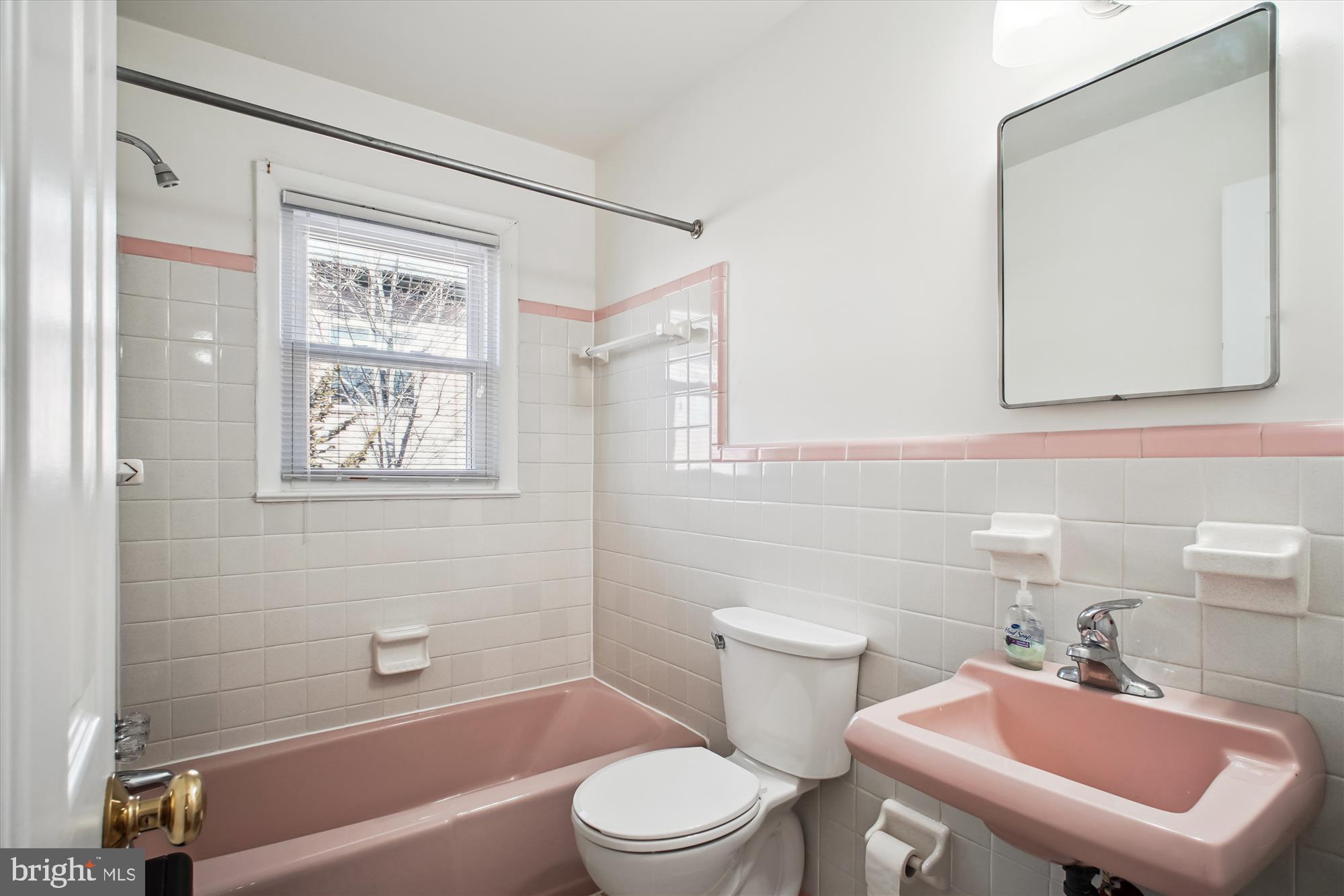 10607 Judicial Drive Fairfax, VA 22030 - Photo 41 of 60 a bathroom with a sink a toilet and a mirror