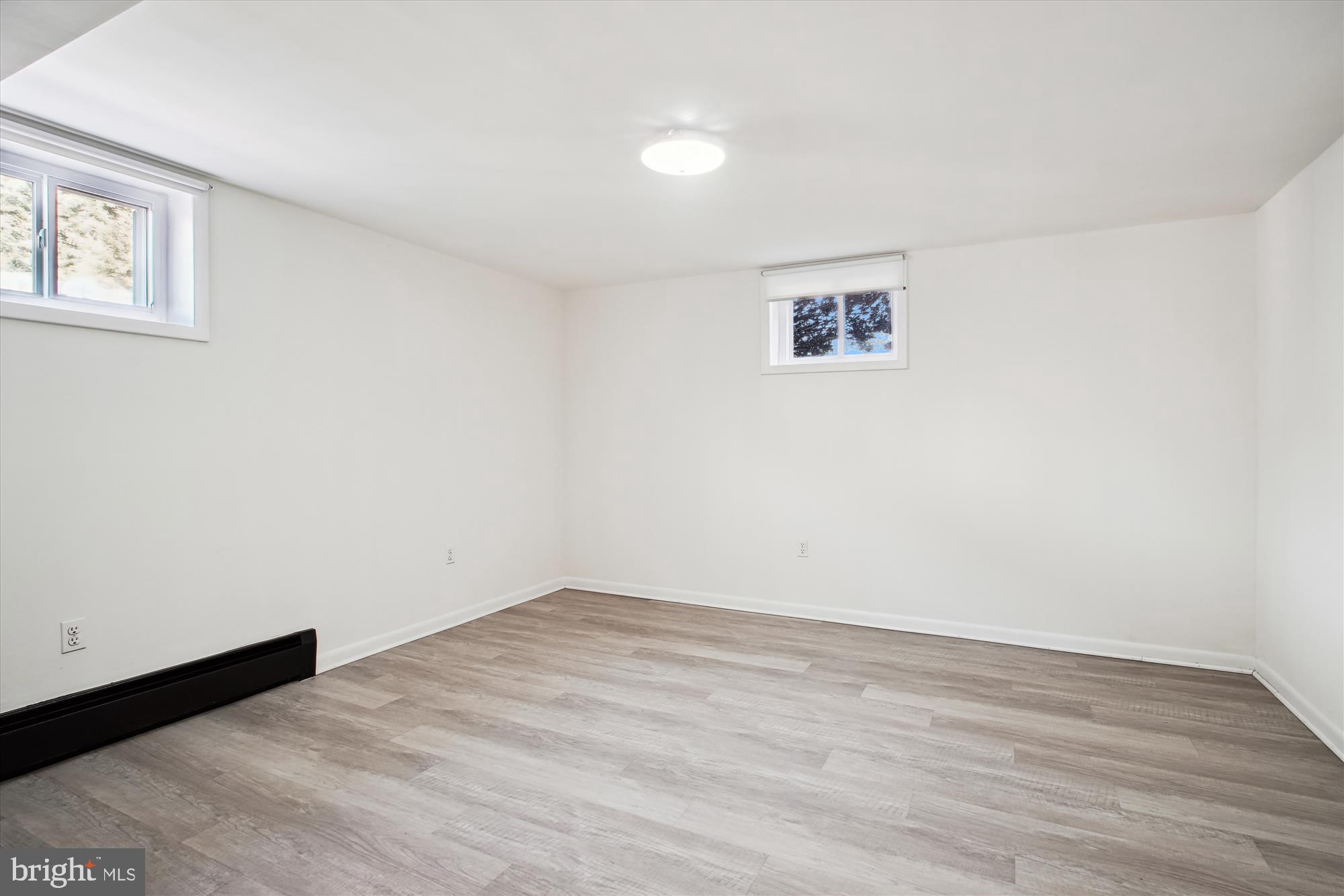 10607 Judicial Drive Fairfax, VA 22030 - Photo 56 of 60 a view of empty room with wooden floor