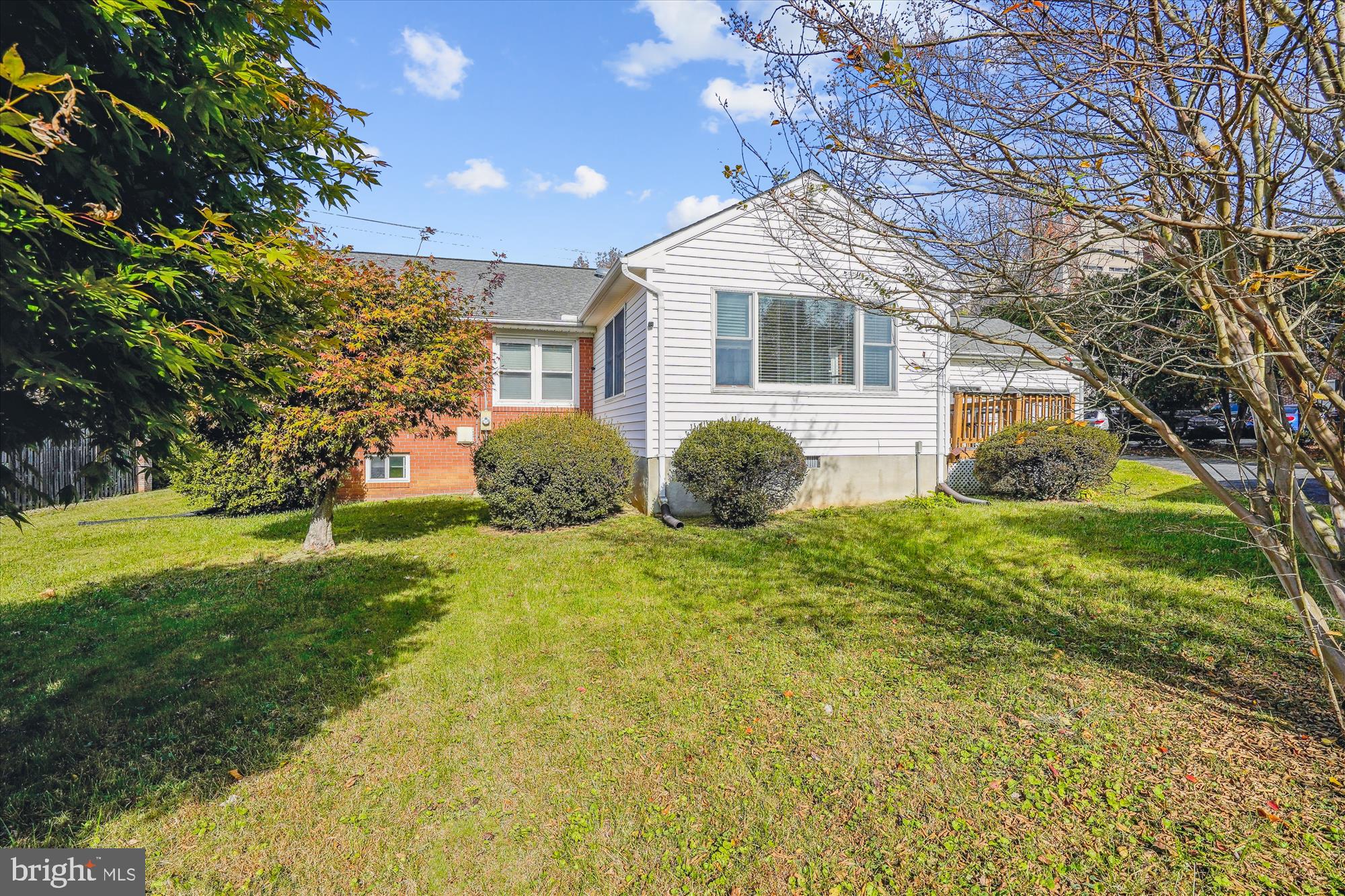 10607 Judicial Drive Fairfax, VA 22030 - Photo 9 of 60 a front view of a house with garden