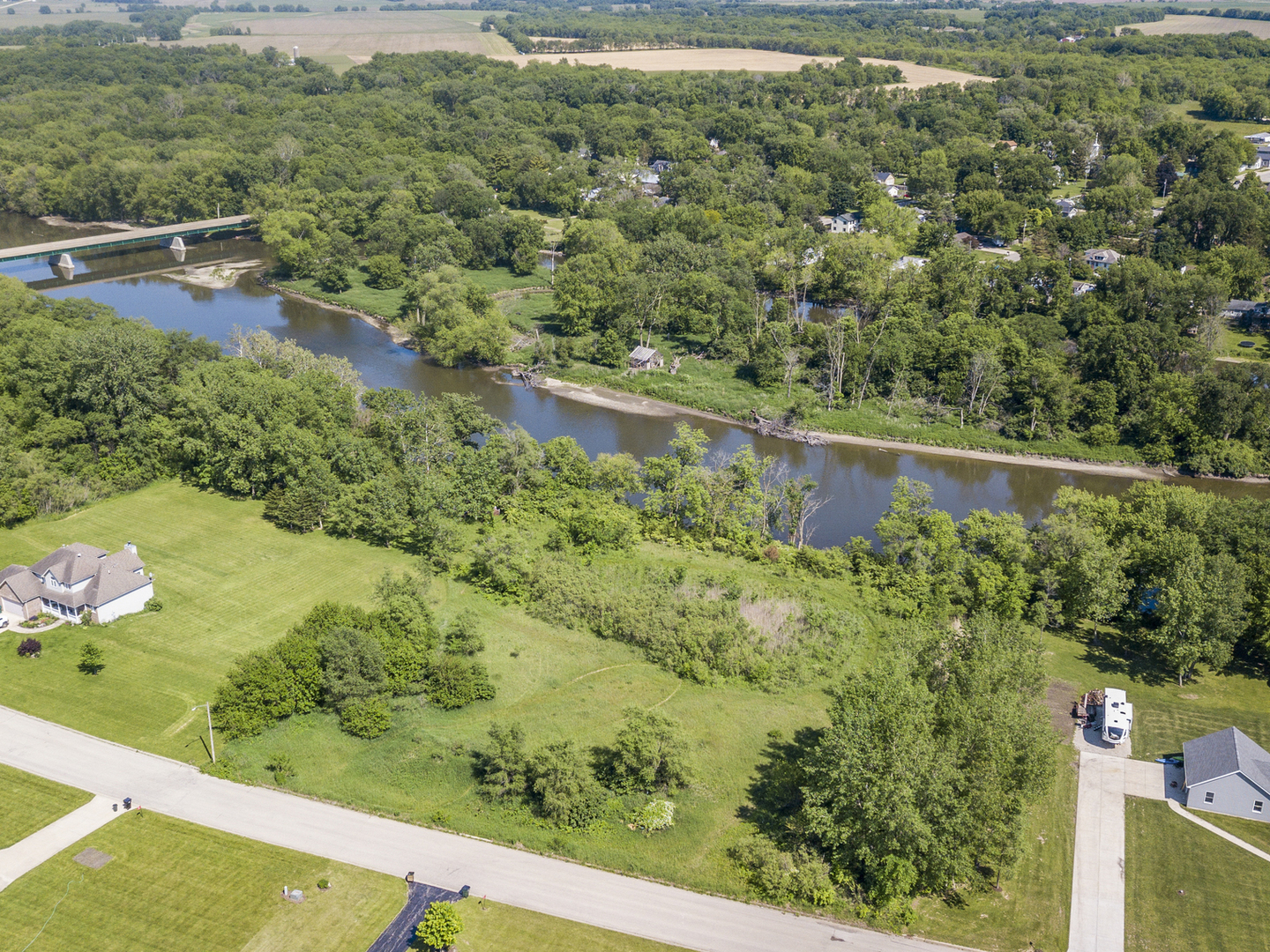 5 Belle Rive Drive Millington, IL 60537 - Photo 6 of 16 a view of a green yard with large trees