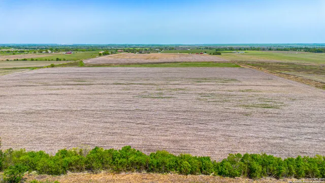 a view of a lake with a city