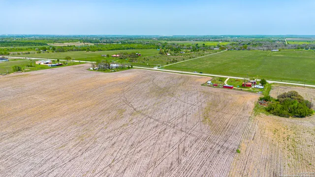 swimming view of a lake with a yard