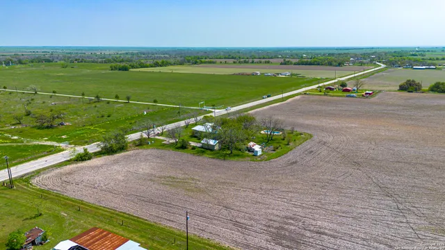 a view of a lake with a big yard