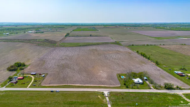 a view of a yard with an outdoor space